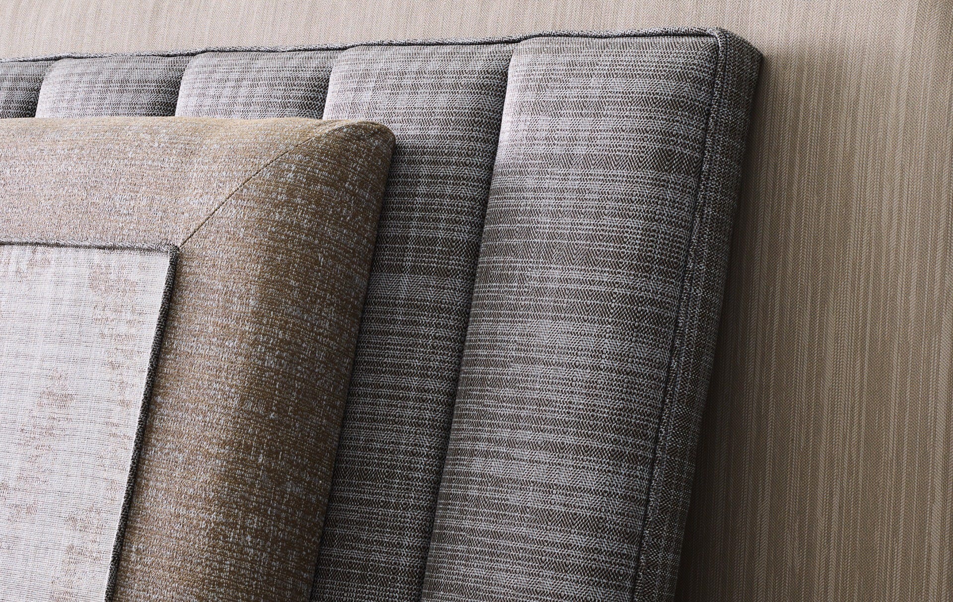 Grey woven Xorel upholstery on a cushioned chair with timber frame